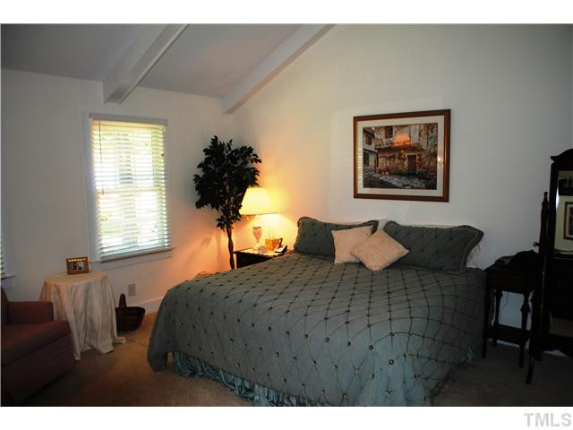 1505 Farmington Court Raleigh, NC 27615 - Photo 25 of 25 This master bedroom suite is ready for you to move right in. Large, open and airy you'll love this very private space. Master Suite