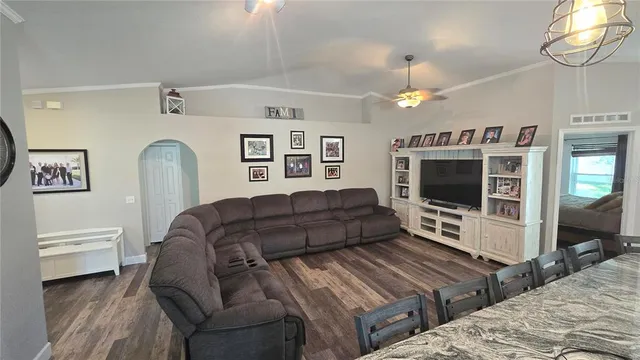 a bathroom with a sink a mirror and a shower