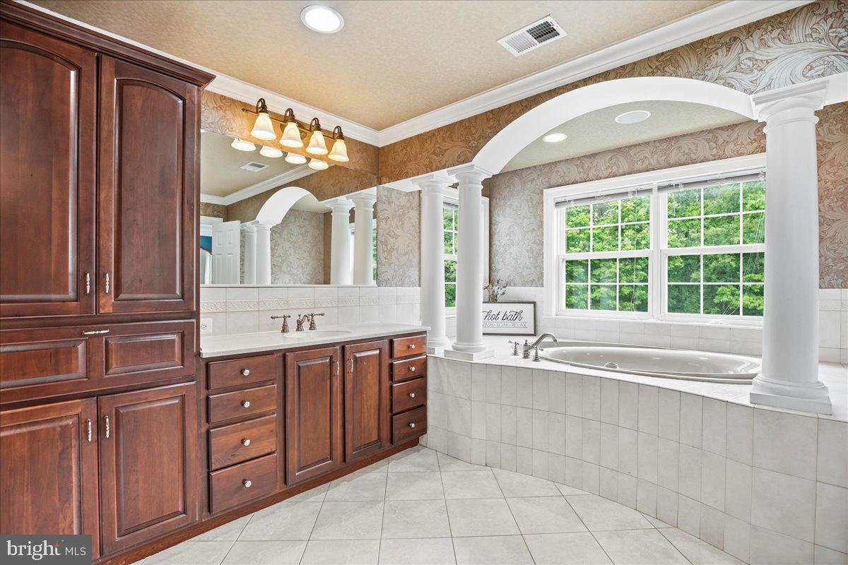 4100 Hidden Creek Road Port Republic, MD 20676 - Photo 76 of 99 Primary bathroom with substantial cabinet space