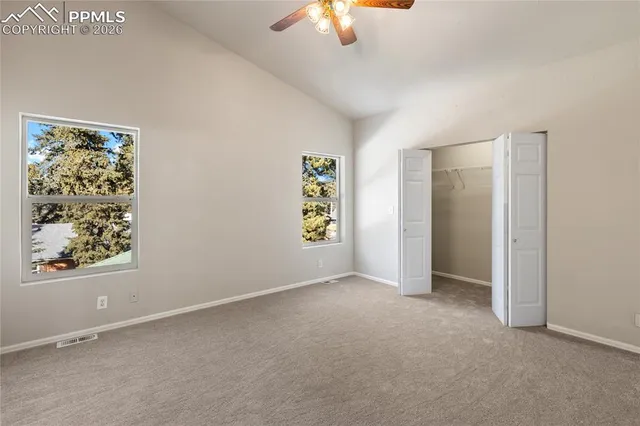 an empty room with windows