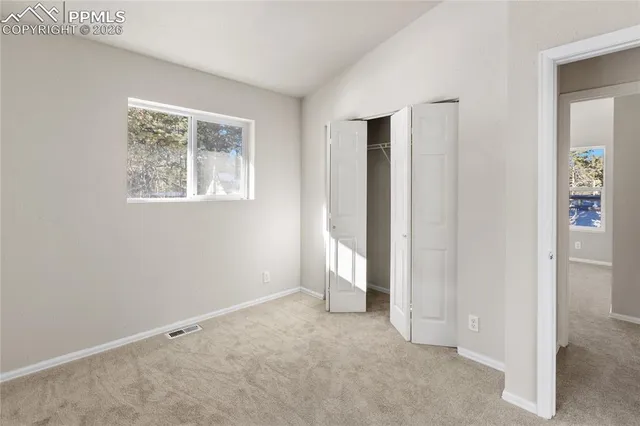 an empty room with windows