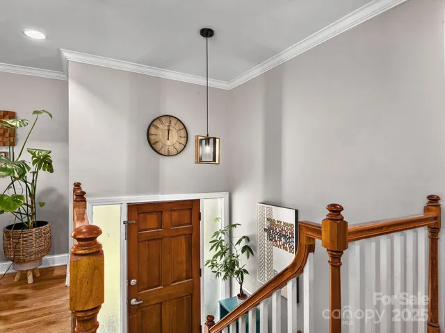 a view of a hallway with seating area