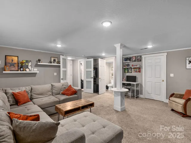 a living room with furniture and a couch