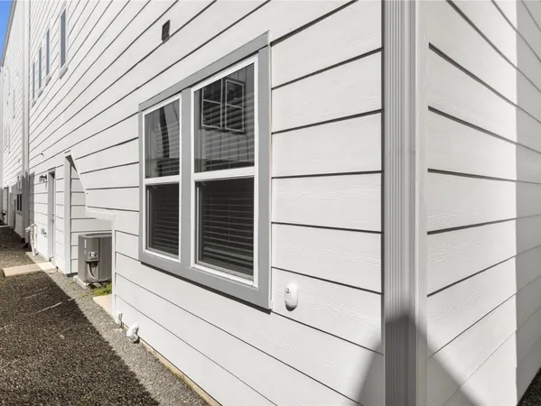 a view of a house with a large window