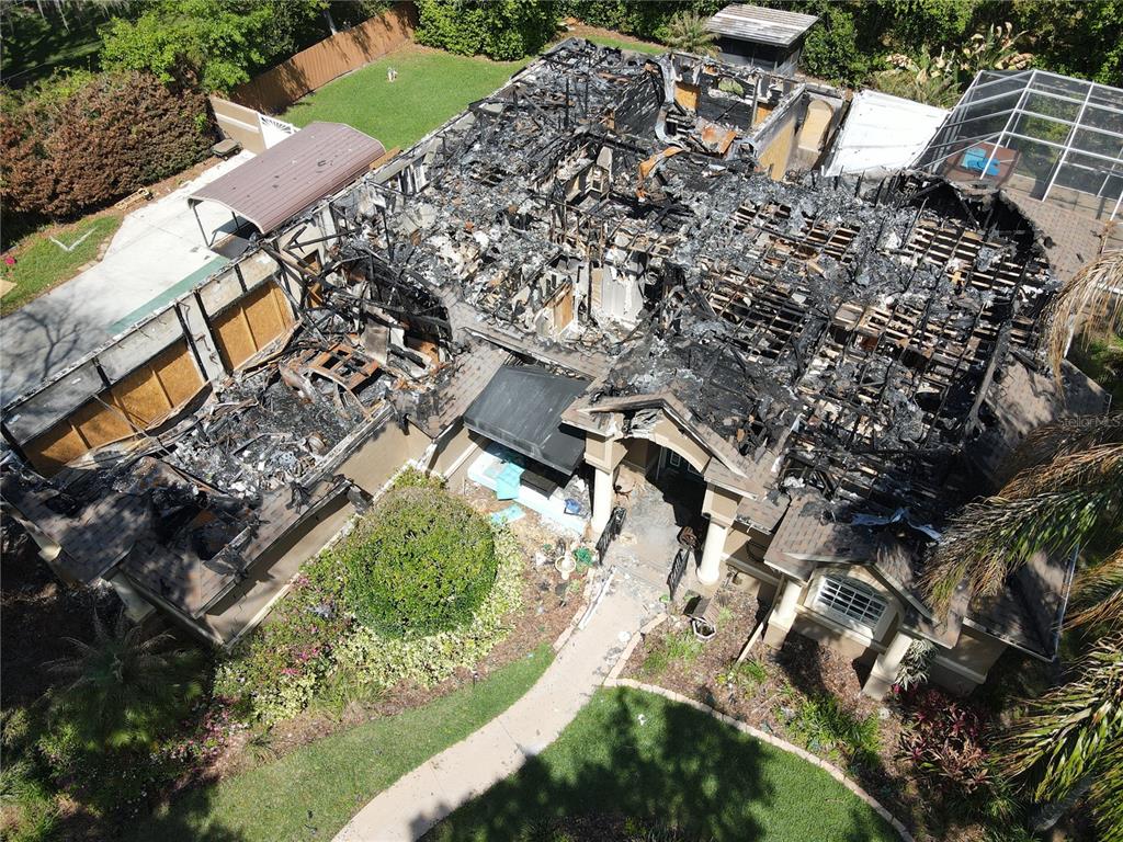 3615 Berger Road Lutz, FL 33548 - Photo 1 of 1 an aerial view of a house with a yard