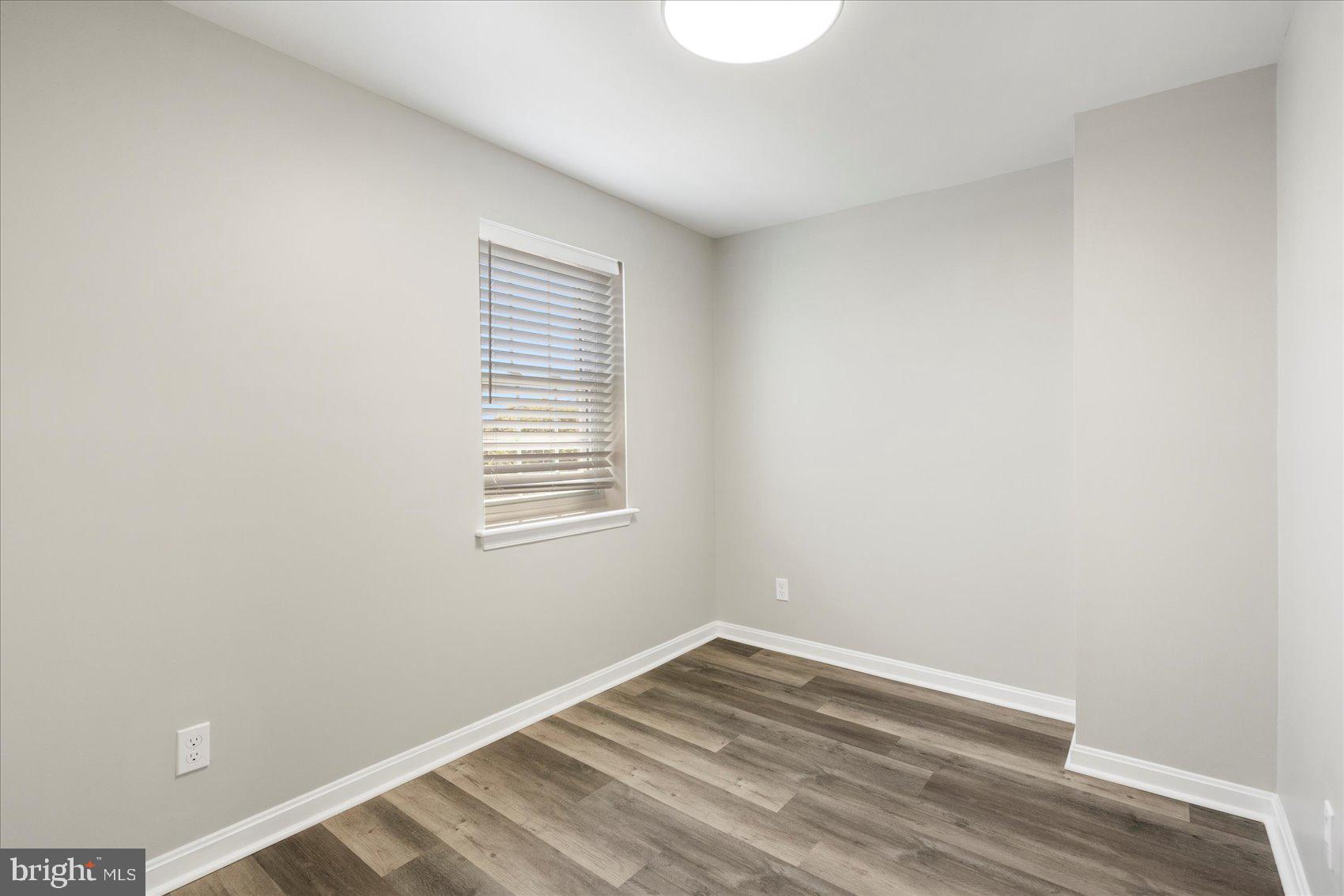 535 Mosher Street Baltimore, MD 21217 - Photo 20 of 28 a view of empty room with wooden floor