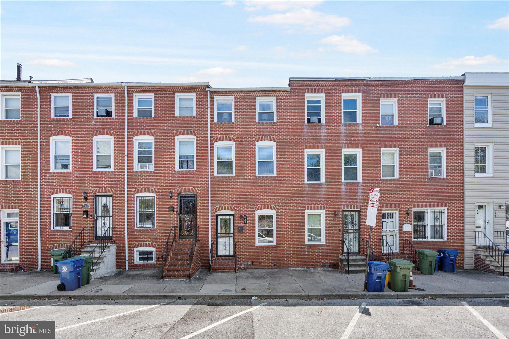 535 Mosher Street Baltimore, MD 21217 - Photo 28 of 28 a front view of a building with street view