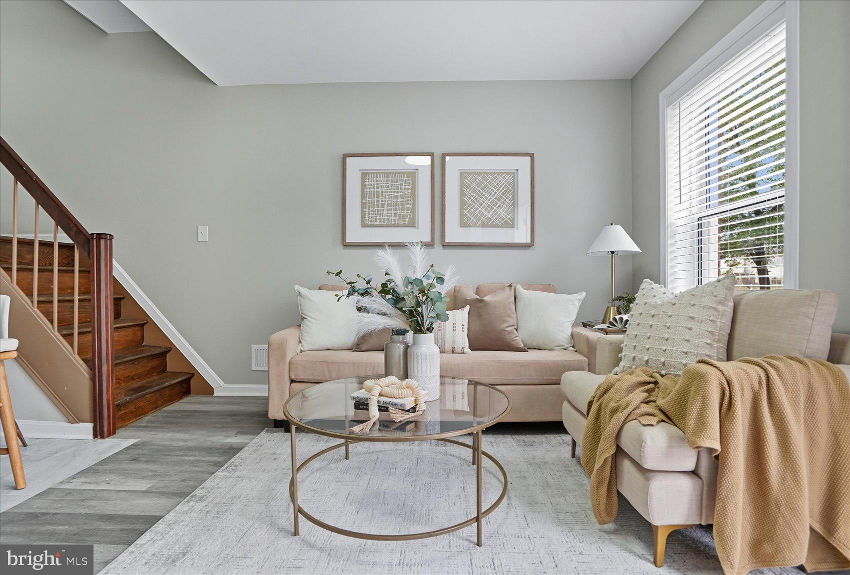 535 Mosher Street Baltimore, MD 21217 - Photo 3 of 28 a living room with furniture potted plant and a window