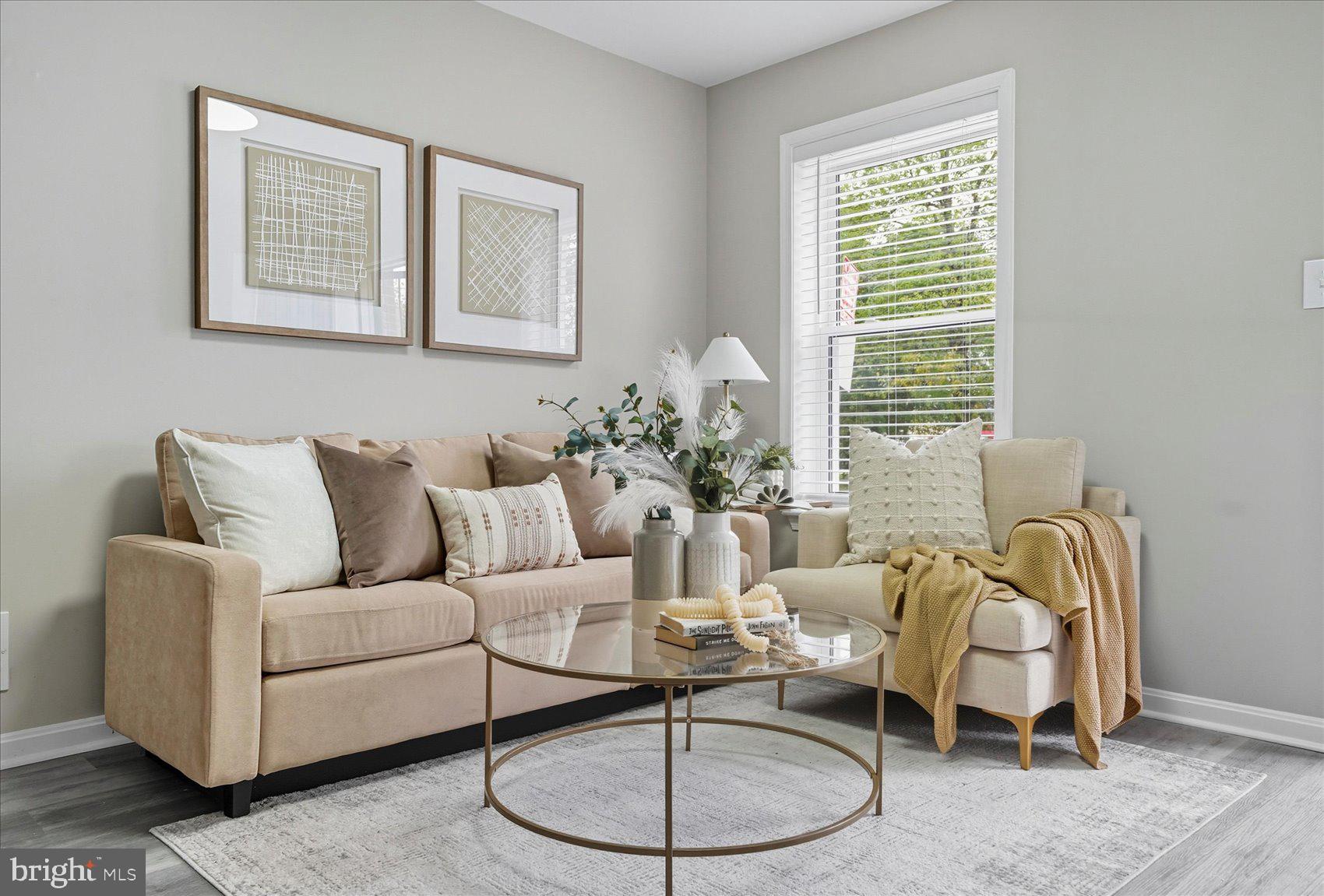 535 Mosher Street Baltimore, MD 21217 - Photo 4 of 28 a living room with furniture and a window