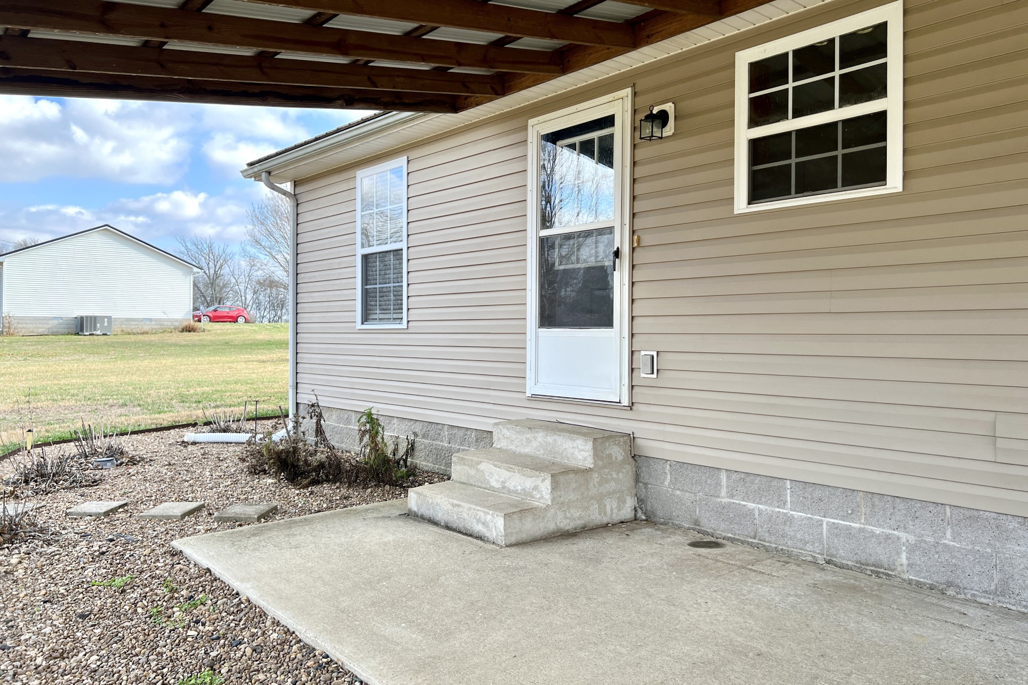 5145 Blackjack Road Franklin, KY 42134 - Photo 25 of 28 a view of a house with a yard and sitting space