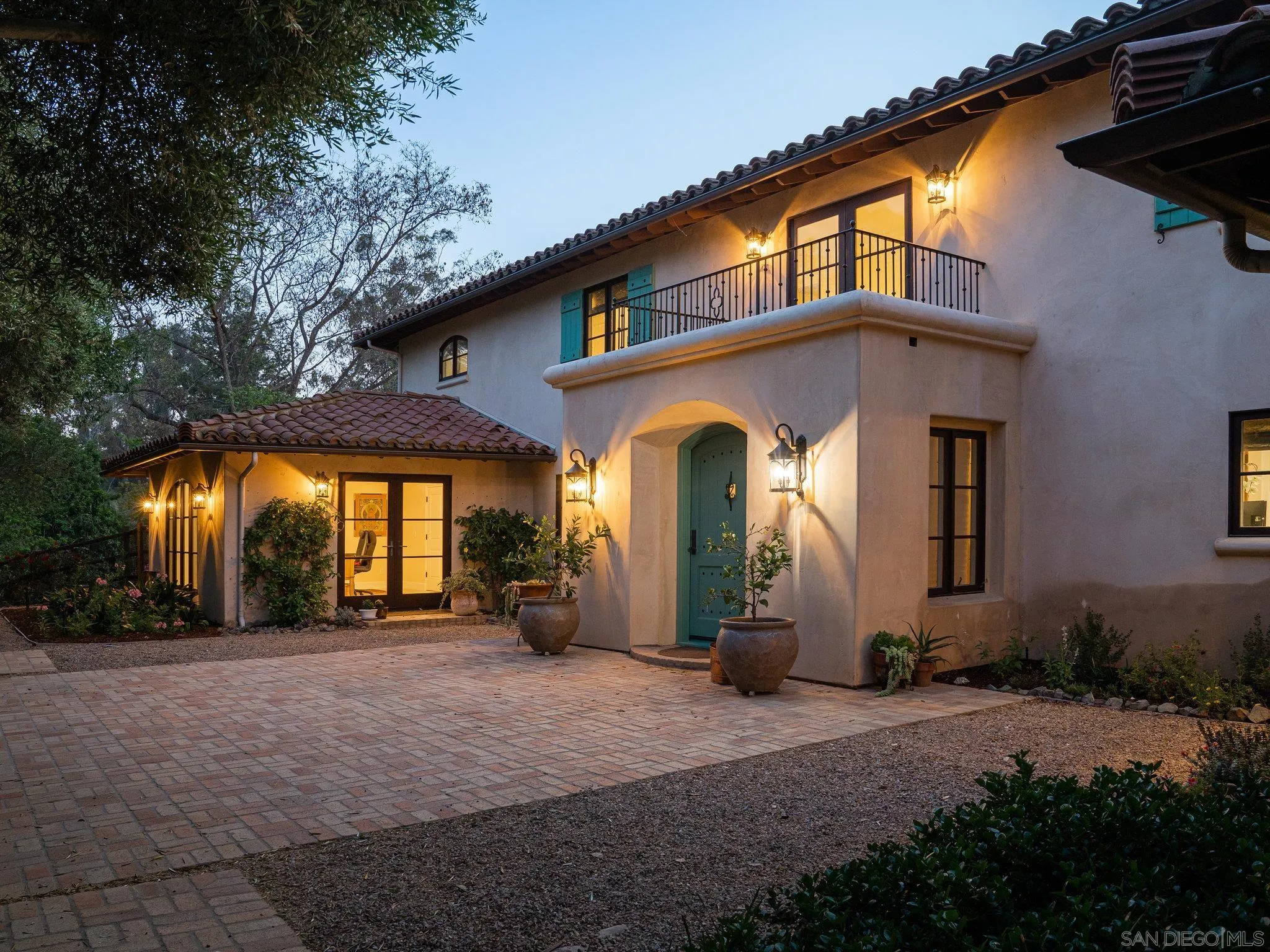 16338 Via Del Alba Rancho Santa Fe, CA 92067 - Photo 4 of 46 a view of a house with large windows and a yard