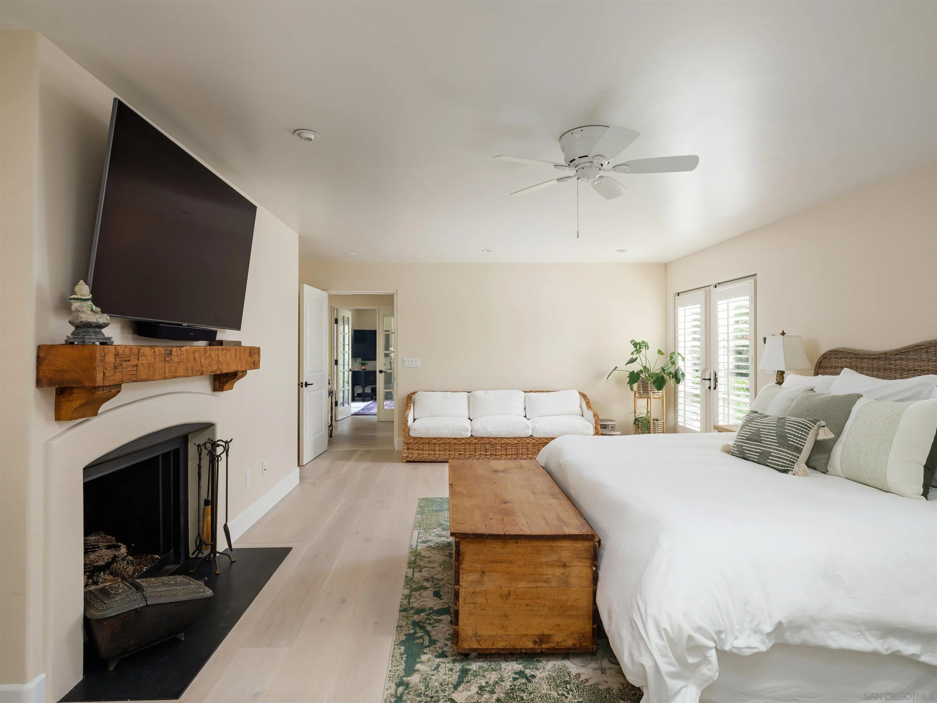 16338 Via Del Alba Rancho Santa Fe, CA 92067 - Photo 41 of 46 a bedroom with a bed and a flat screen tv