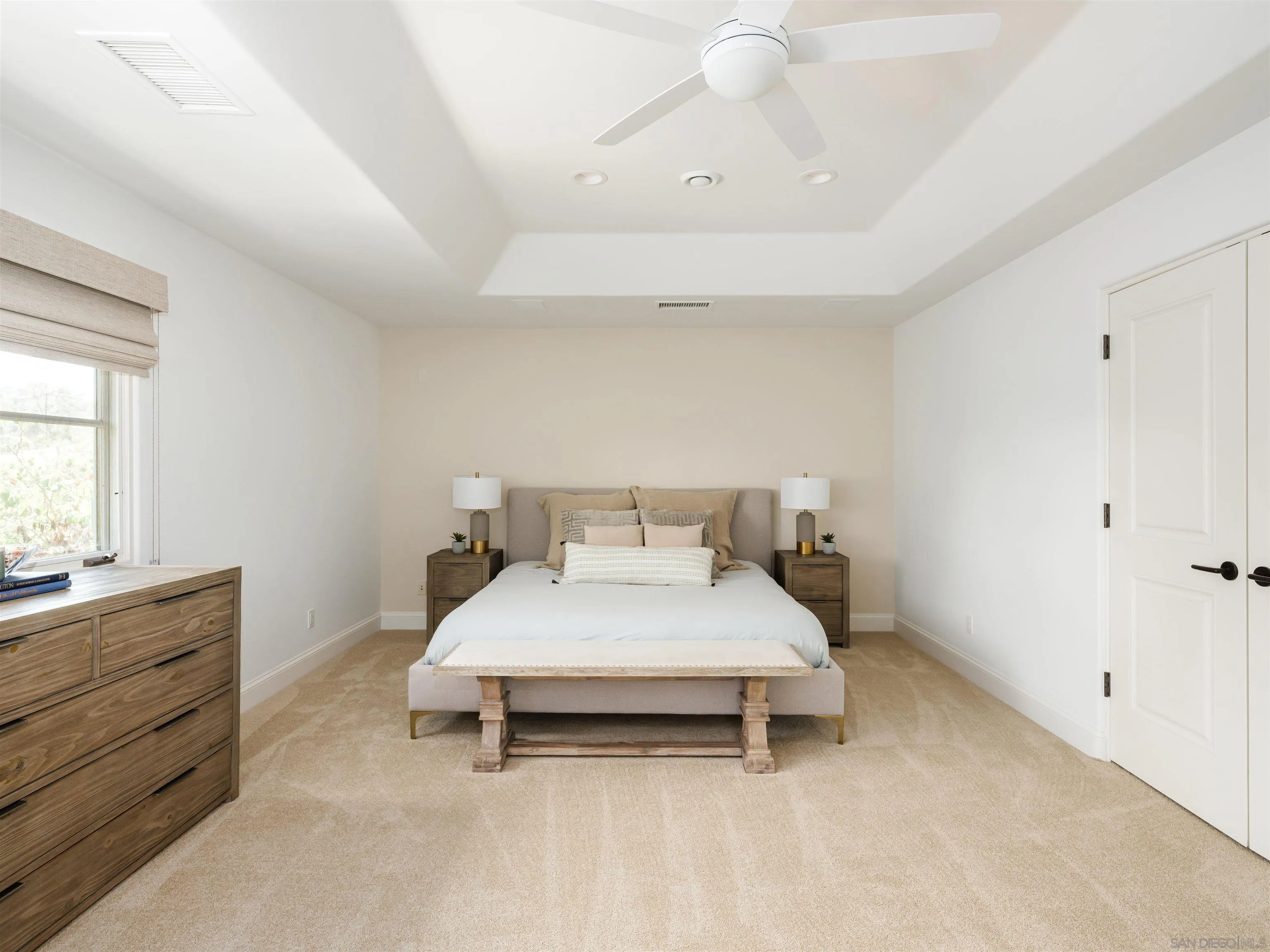 16338 Via Del Alba Rancho Santa Fe, CA 92067 - Photo 44 of 46 a bedroom with a bed and a dresser