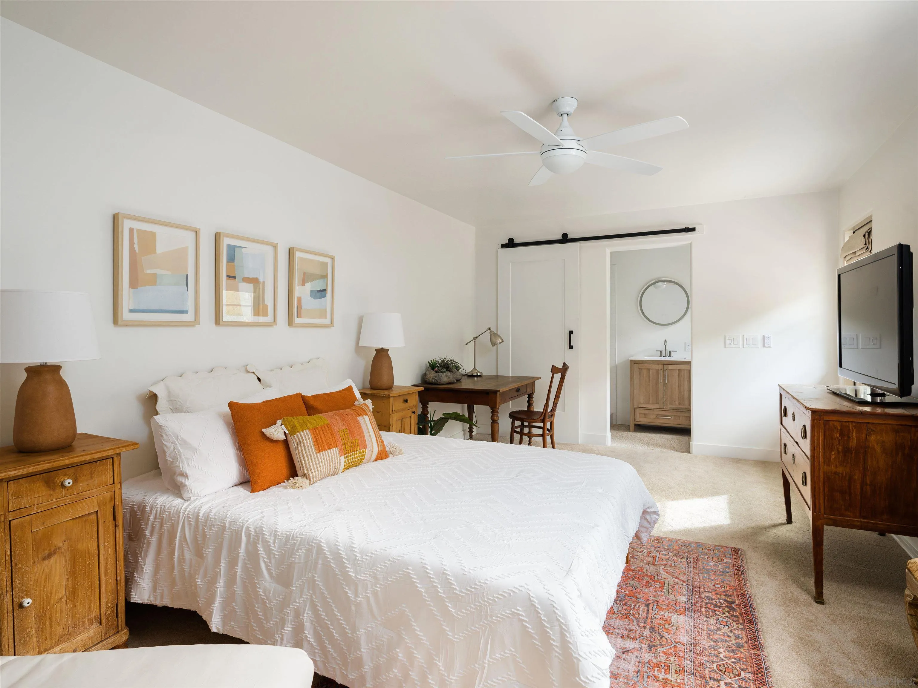 16338 Via Del Alba Rancho Santa Fe, CA 92067 - Photo 45 of 46 a bedroom with furniture and a flat screen tv