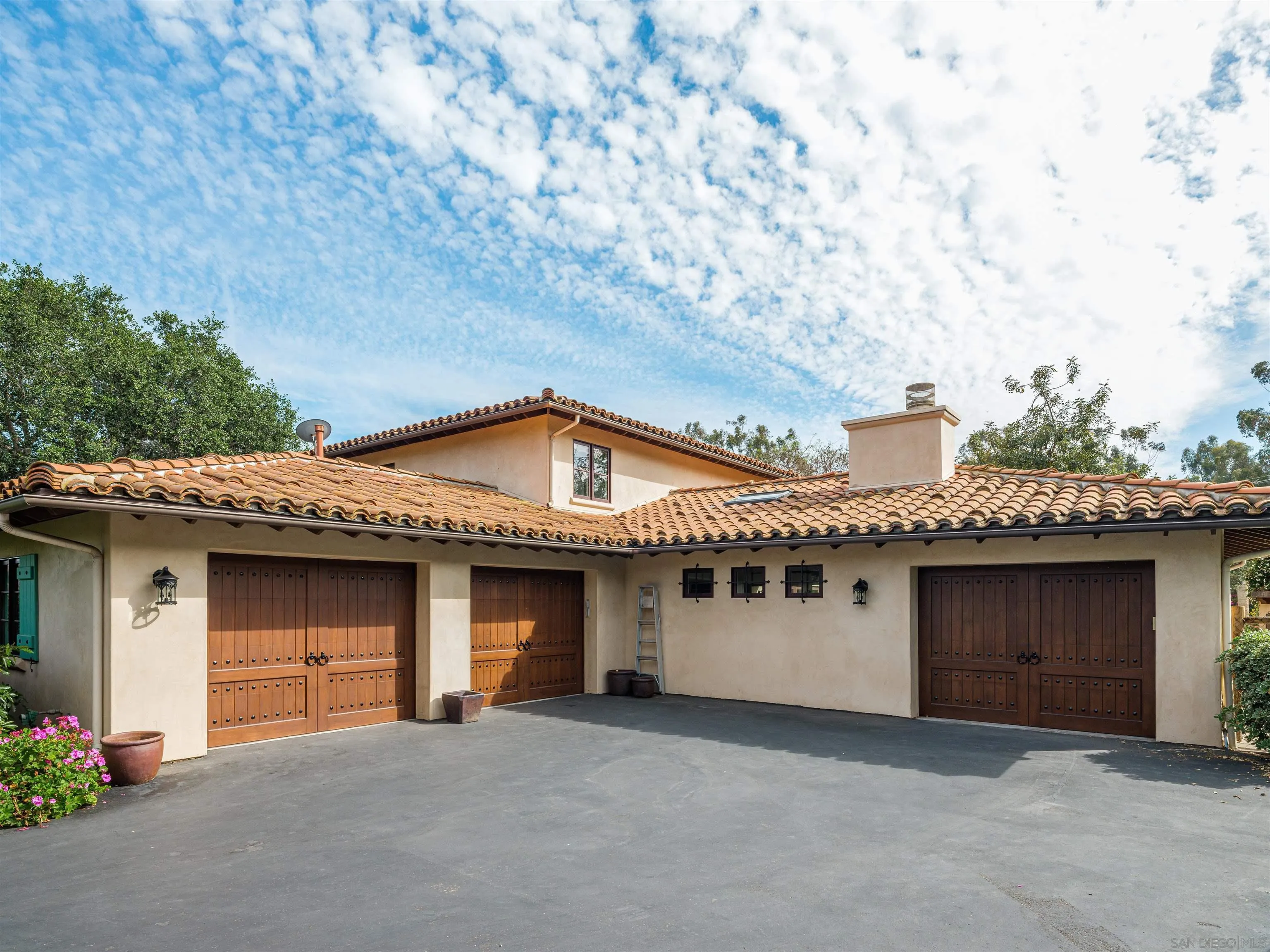 16338 Via Del Alba Rancho Santa Fe, CA 92067 - Photo 7 of 46 a view of a house with a garage
