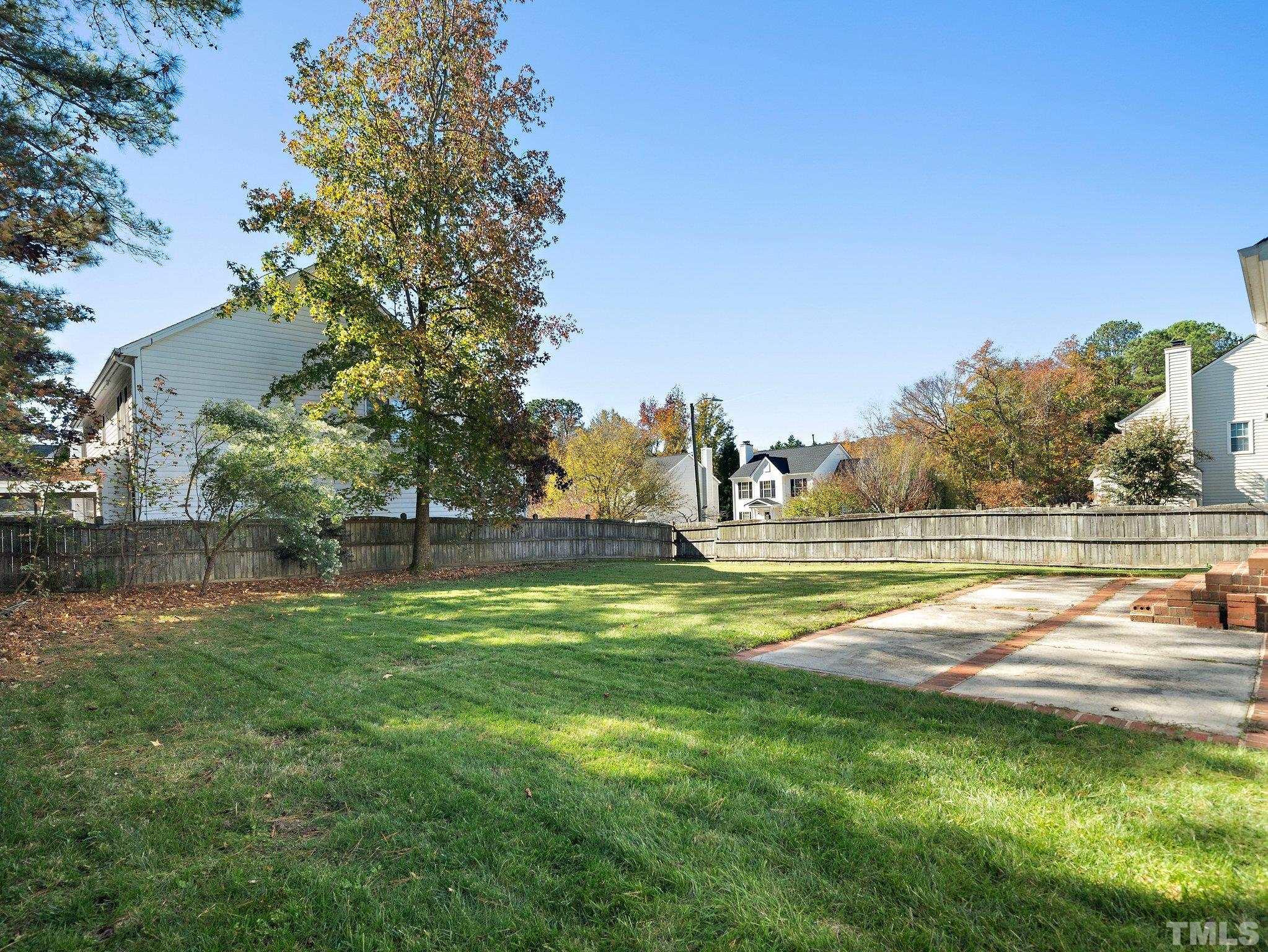 9821 Rockledge Drive Raleigh, NC 27617 - Photo 25 of 26 a swimming pool with outdoor seating and yard