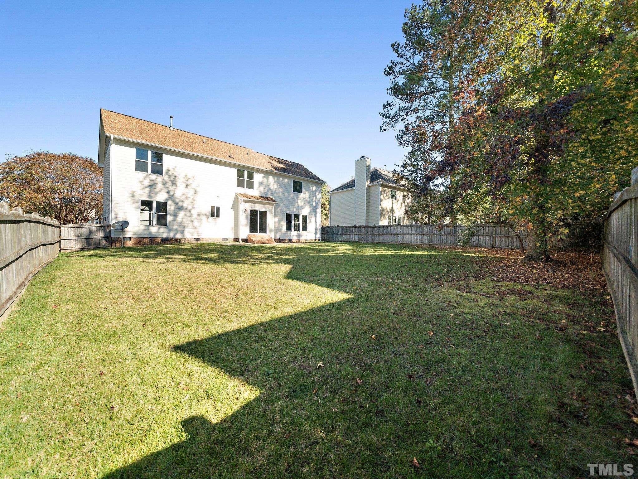 9821 Rockledge Drive Raleigh, NC 27617 - Photo 26 of 26 a view of a house with a yard