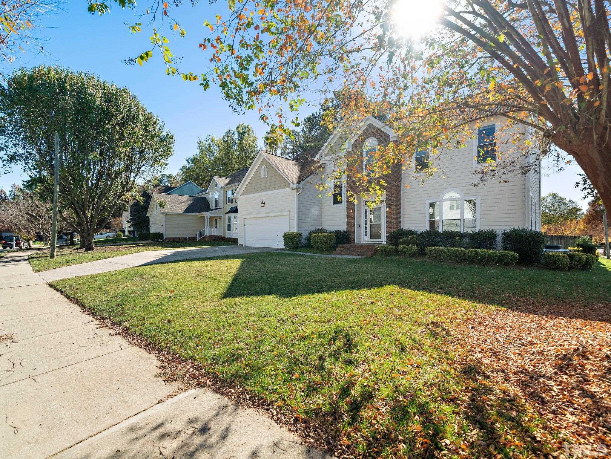 9821 Rockledge Drive Raleigh, NC 27617 - Photo 3 of 26 a view of swimming pool with tree in front of it