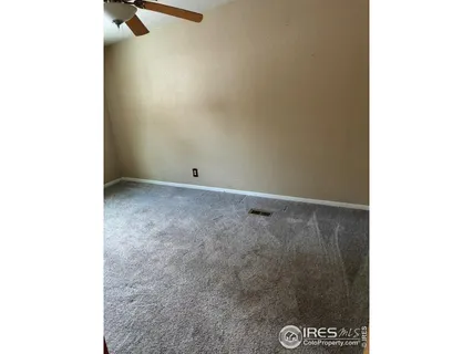 a view of a small space with a fan