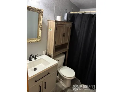 a view of a glass door and a window