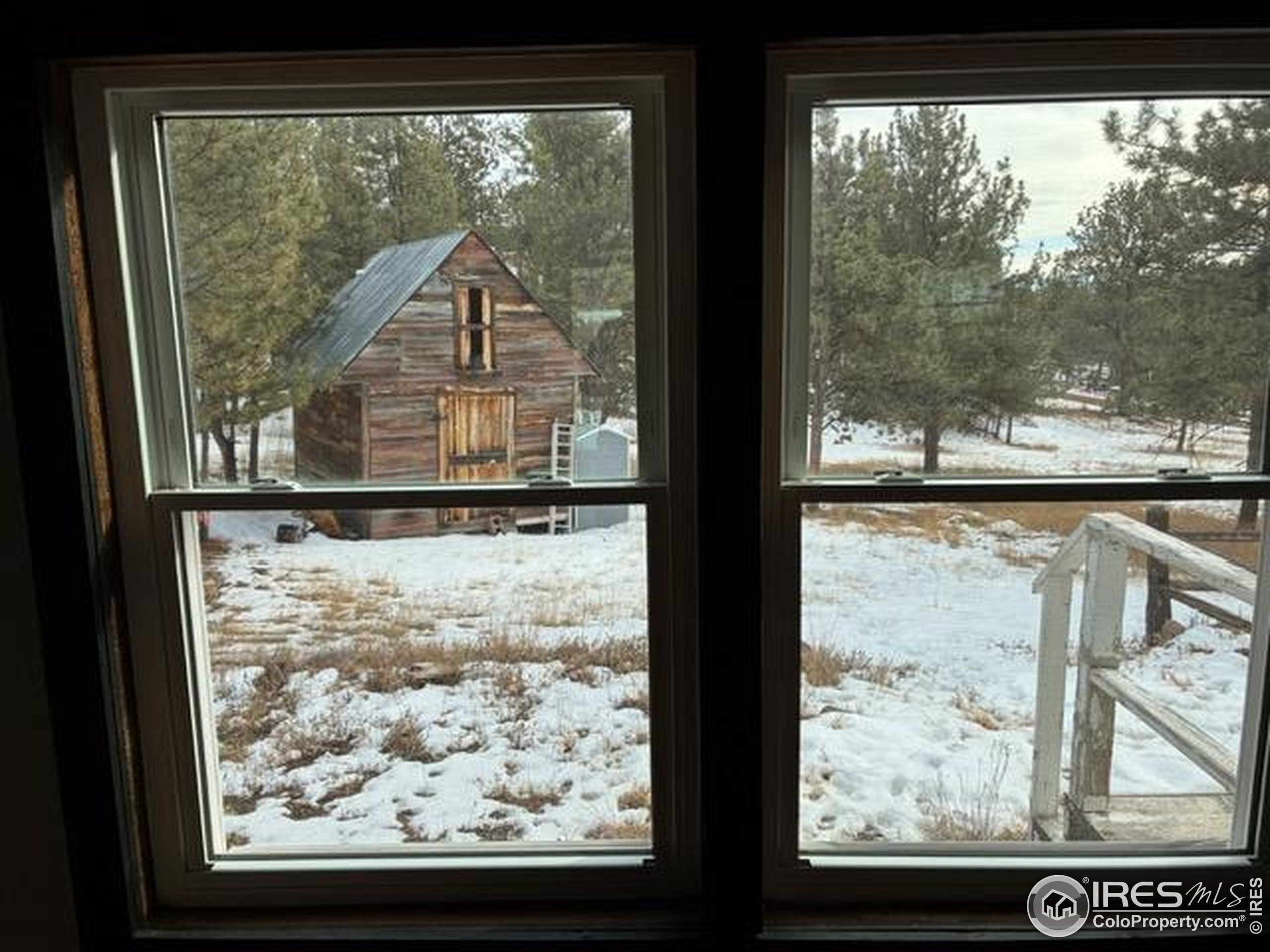 1759 Arapahoe Drive Florissant, CO 80816 - Photo 34 of 40 a view of a glass door and a window