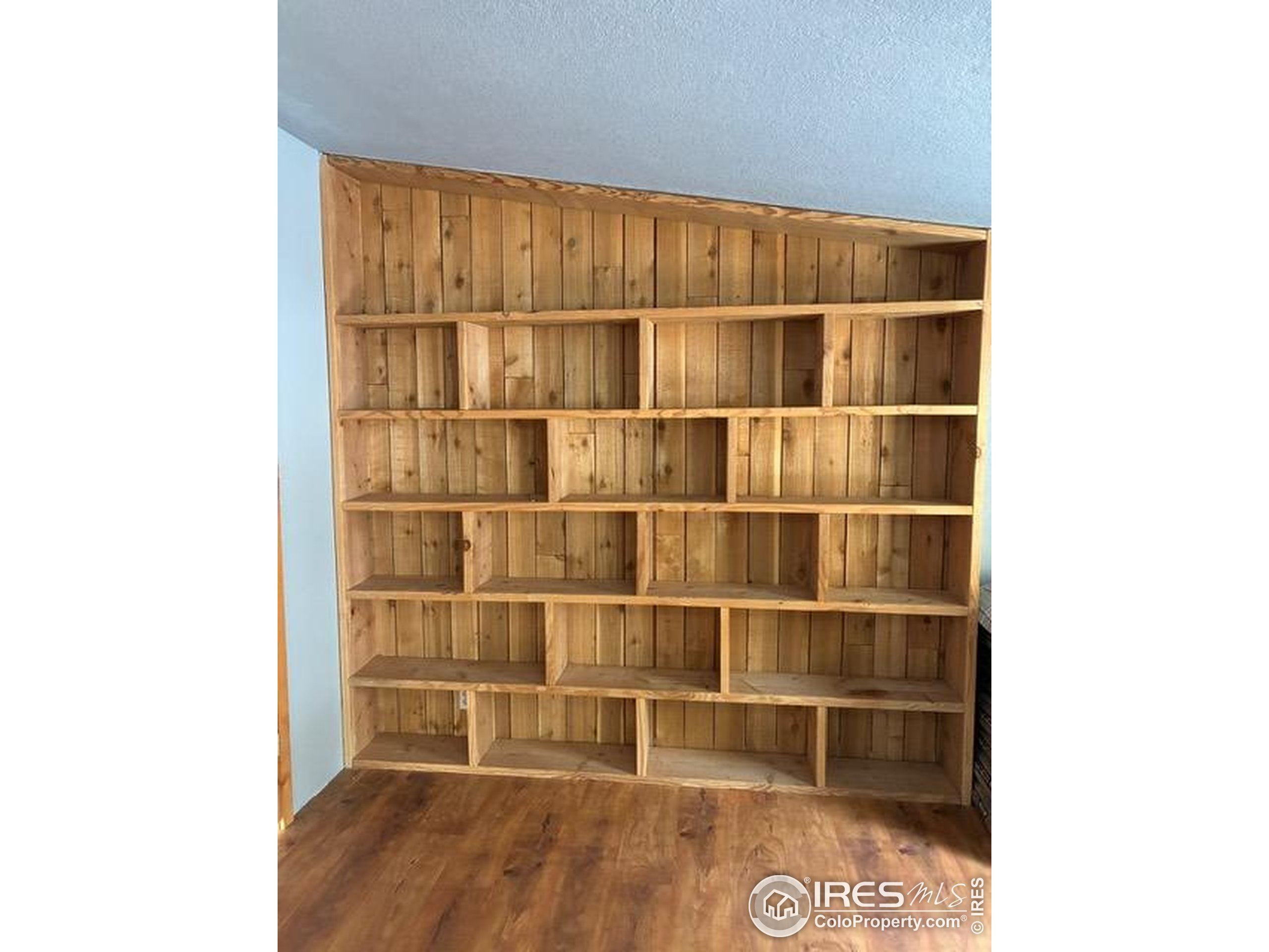 1759 Arapahoe Drive Florissant, CO 80816 - Photo 35 of 40 a room with a wooden floor