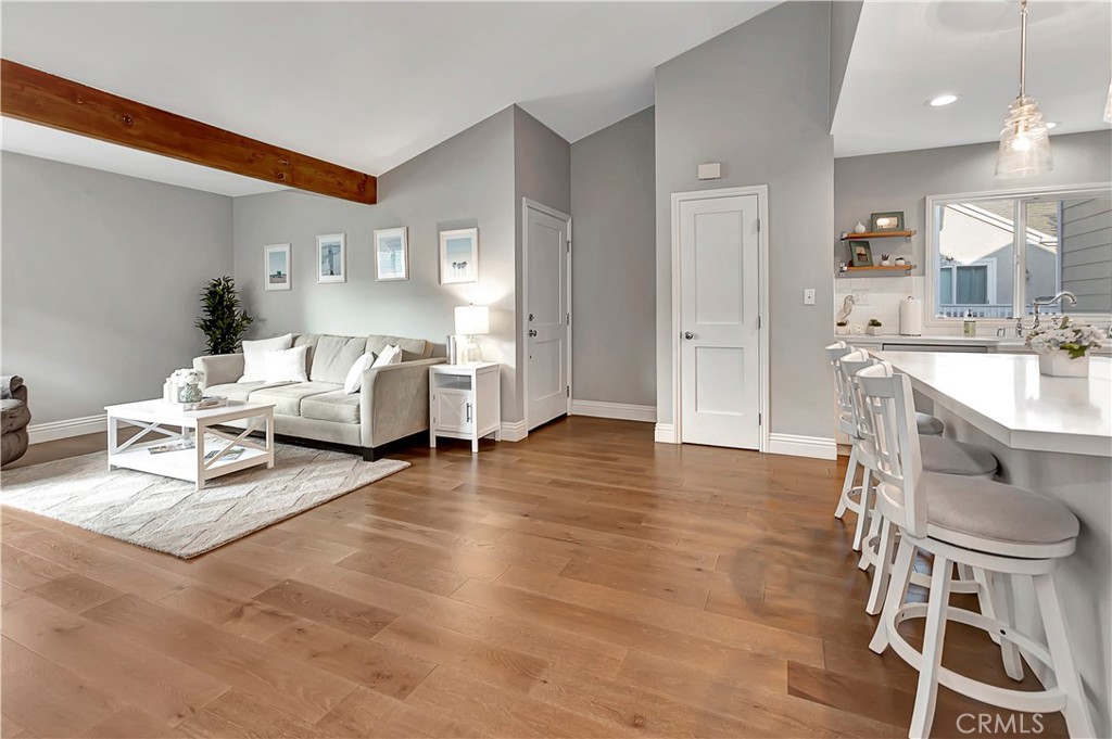 34014 Selva Road, Unit 19 Dana Point, CA 92629 - Photo 11 of 19 a living room with furniture and a wooden floor