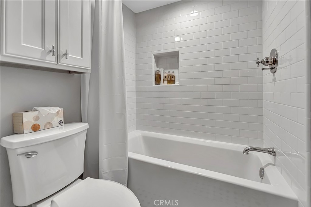 34014 Selva Road, Unit 19 Dana Point, CA 92629 - Photo 15 of 19 a bathroom with a toilet sink and bathtub