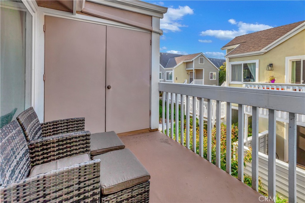 34014 Selva Road, Unit 19 Dana Point, CA 92629 - Photo 16 of 19 a view of a street with stairs and a brick wall