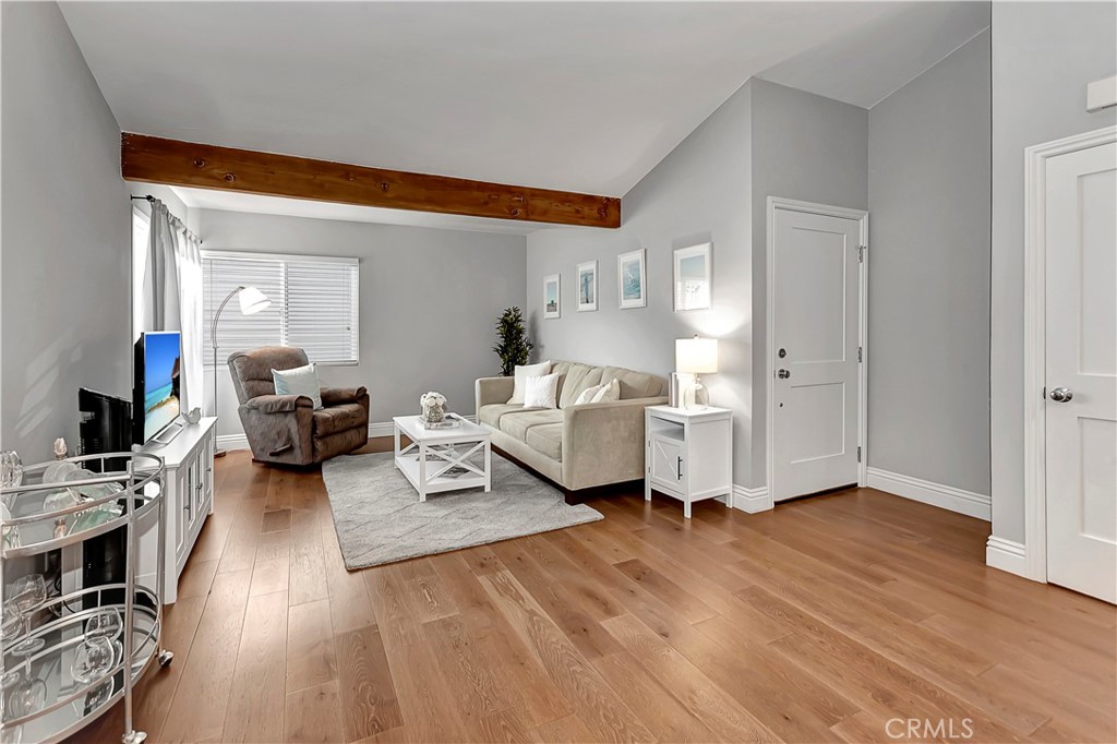 34014 Selva Road, Unit 19 Dana Point, CA 92629 - Photo 7 of 19 a living room with furniture and a wooden floor
