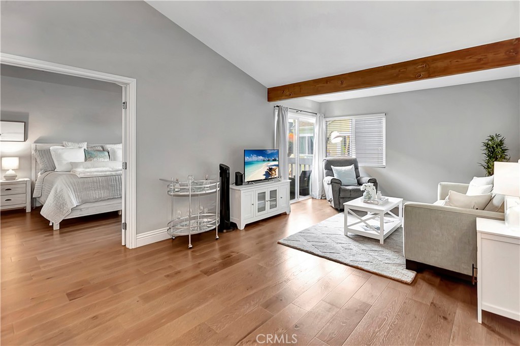 34014 Selva Road, Unit 19 Dana Point, CA 92629 - Photo 8 of 19 a living room with furniture and a wooden floor