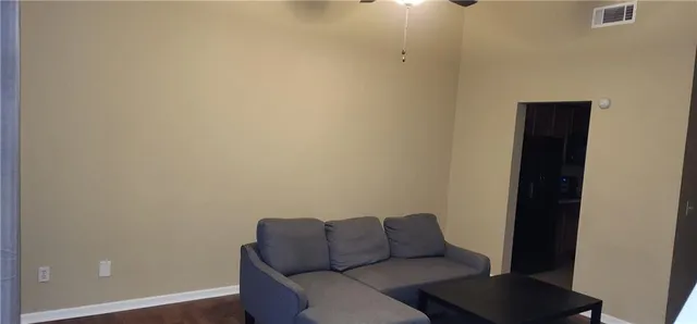 a blue room with a couch