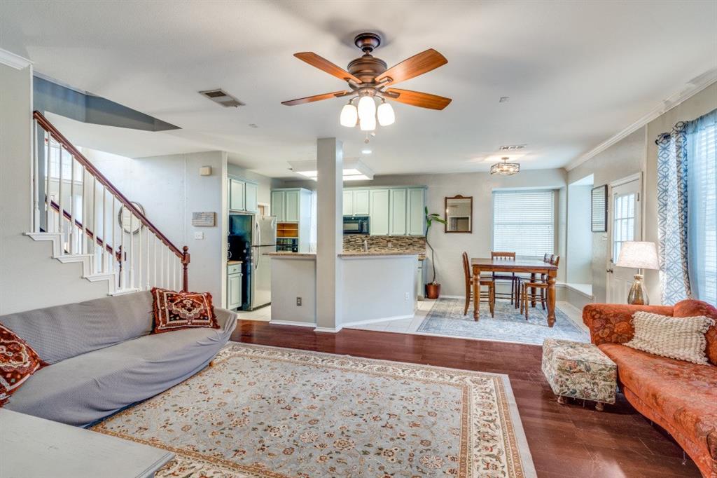 2031 Knights Court Allen, TX 75013 - Photo 3 of 12 a living room with furniture and a chandelier