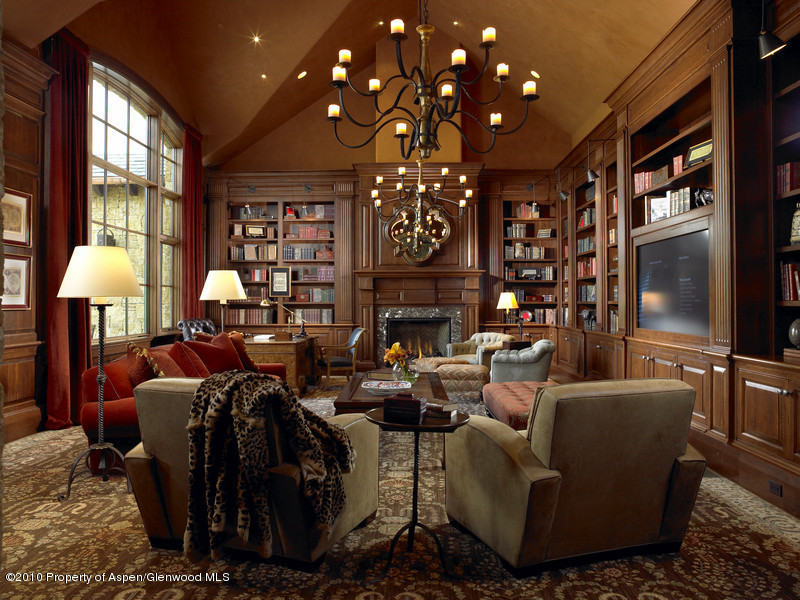 1518 West Buttermilk Road Aspen, CO 81611 - Photo 12 of 40 a living room with fireplace furniture and a large window