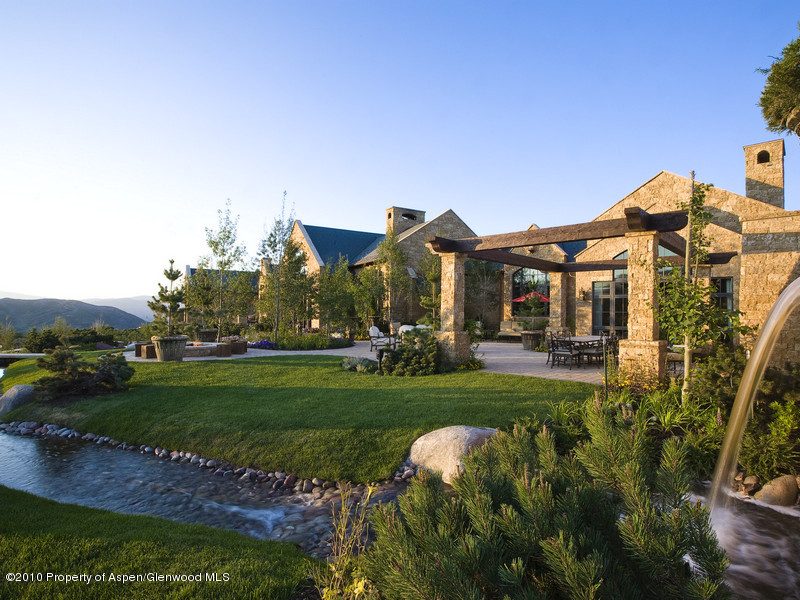 1518 West Buttermilk Road Aspen, CO 81611 - Photo 20 of 40 a front view of a house with garden