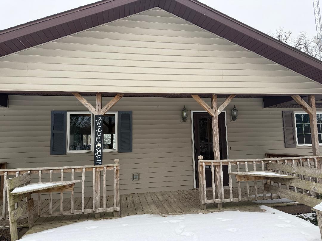 W6399 Brick Church Road Walworth, WI 53184 - Photo 24 of 26 side covered deck with sitting areas