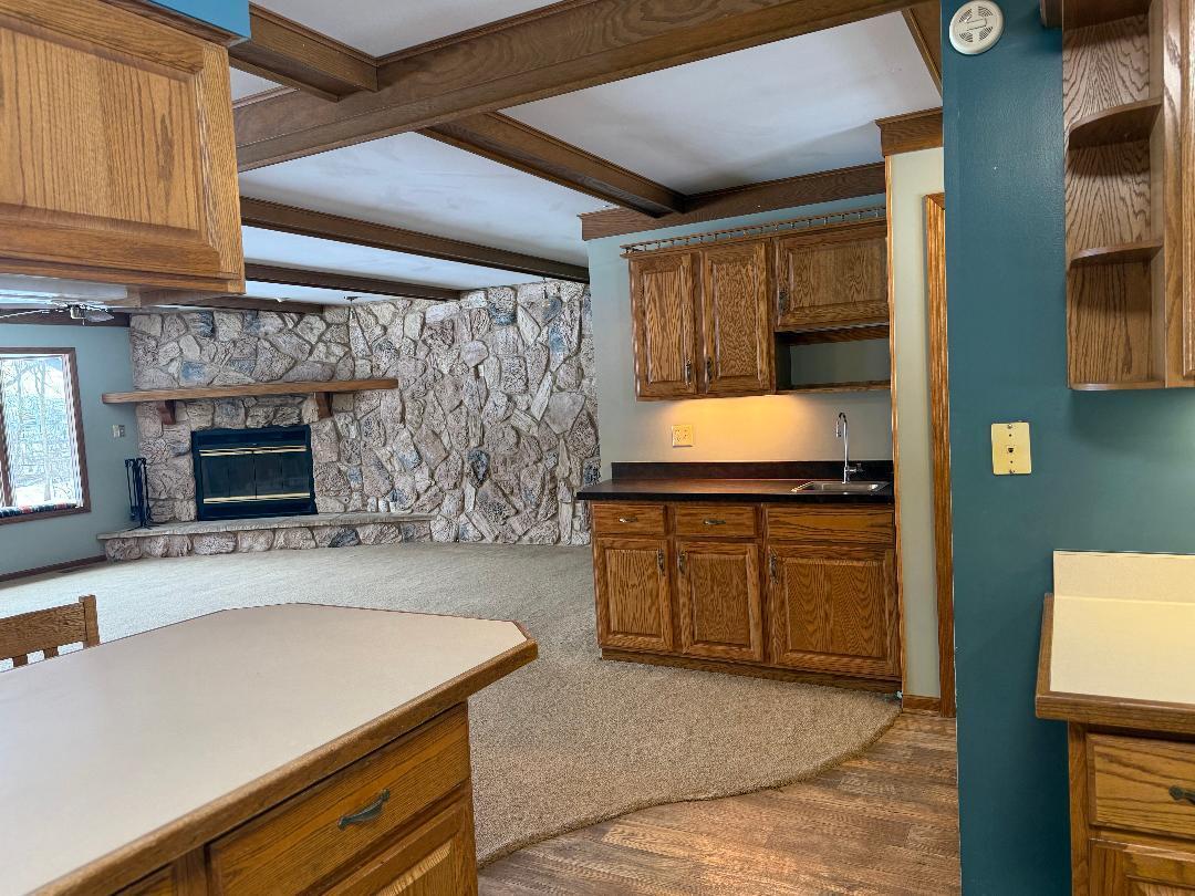 W6399 Brick Church Road Walworth, WI 53184 - Photo 9 of 24 view from kitchen looking into great room and wet bar