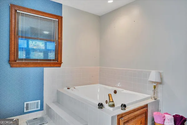 $349,900 | 5011 Southeast West Lake Drive, Conyers, GA 30094