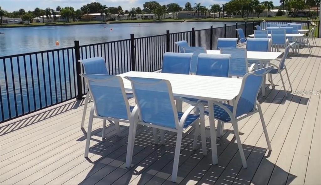 1100 South Belcher Road, Unit 152 Largo, FL 33771 - Photo 8 of 19 a view of a chairs and table on the terrace