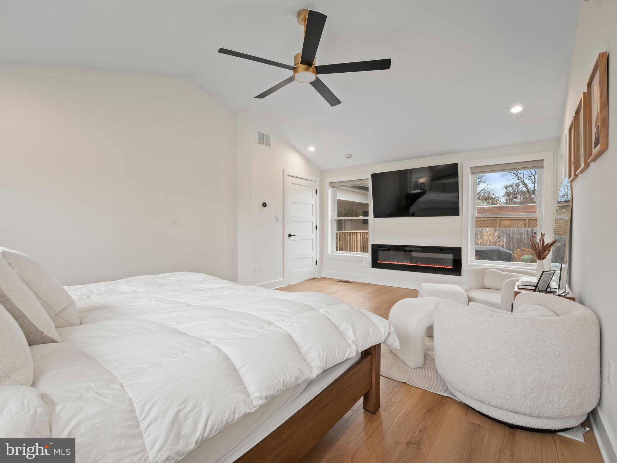 428 Royal Beach Road Pasadena, MD 21122 - Photo 23 of 42 Primary bedroom w/ electric fireplace
