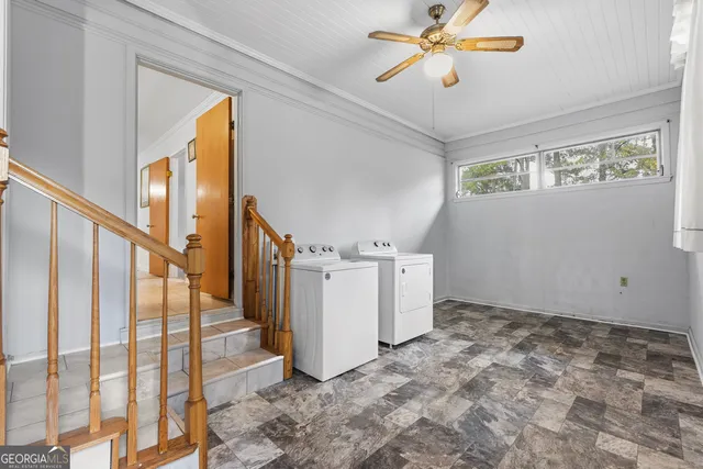 a white toilet sitting next to a bathroom sink