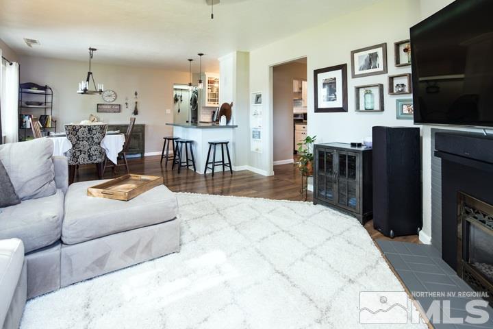 1345 Princess Avenue Reno, NV 89502 - Photo 11 of 23 a living room with furniture and a flat screen tv