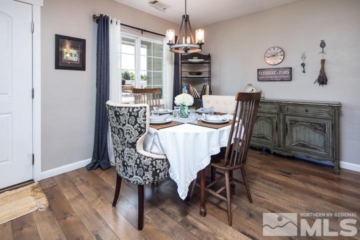1345 Princess Avenue Reno, NV 89502 - Photo 4 of 23 a view of a dining room with furniture window and wooden floor