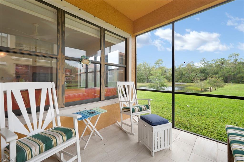 1299 Verde Drive, Unit 1503 Naples, FL 34105 - Photo 7 of 12 a view of a patio with chairs