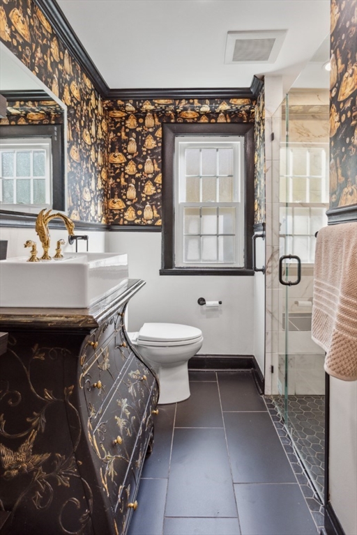 16 Meriam Street Wakefield, MA 01880 - Photo 18 of 42 a bathroom with a sink toilet and shower