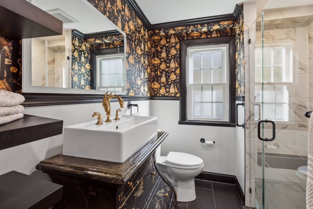 16 Meriam Street Wakefield, MA 01880 - Photo 19 of 42 a bathroom with a sink toilet and shower