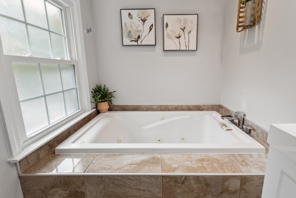 16 Meriam Street Wakefield, MA 01880 - Photo 27 of 42 a bathroom with a tub