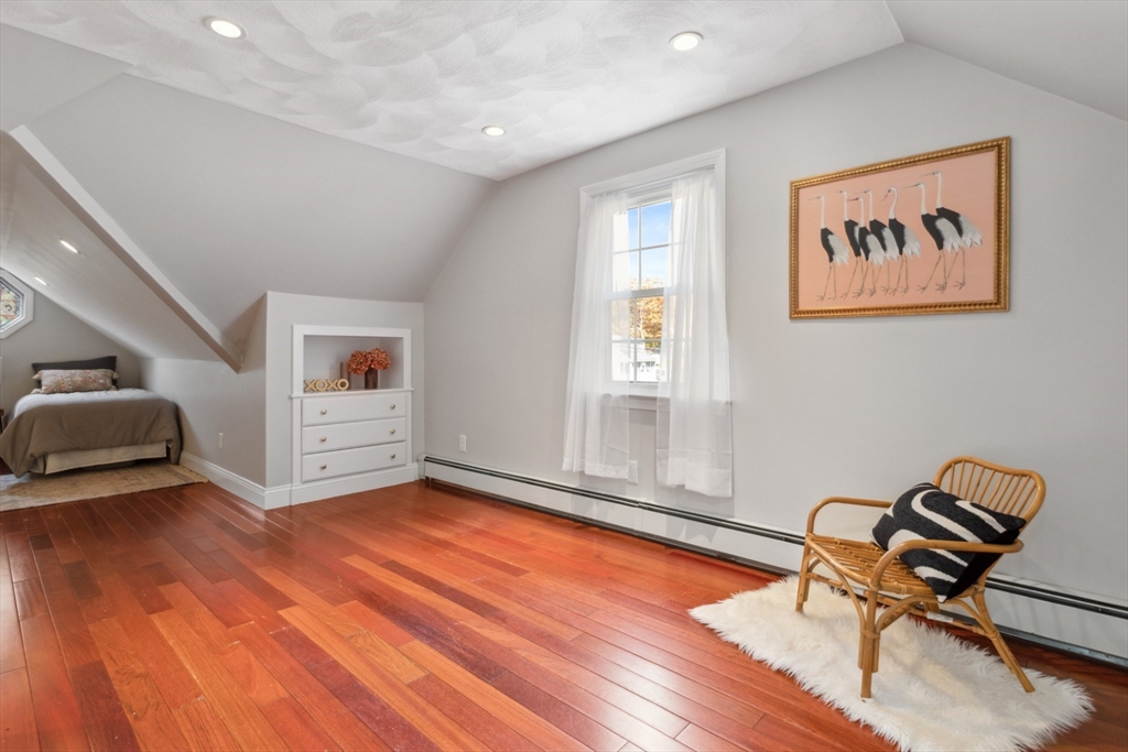 16 Meriam Street Wakefield, MA 01880 - Photo 31 of 42 a view of room with lounge chair and wooden floor