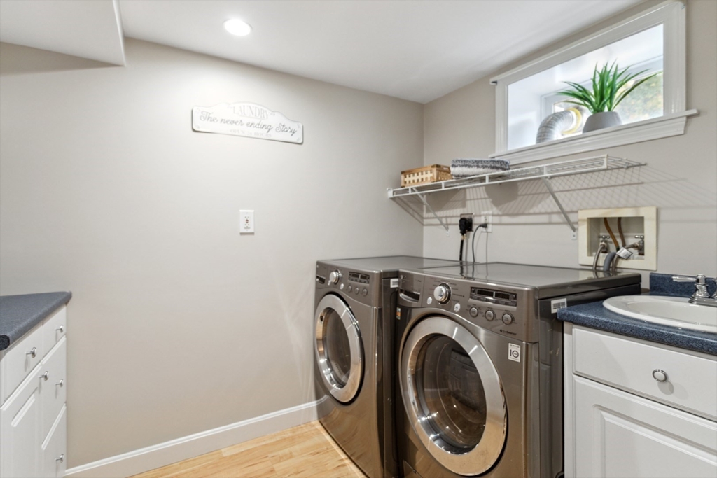 16 Meriam Street Wakefield, MA 01880 - Photo 35 of 42 a utility room with dryer and washer
