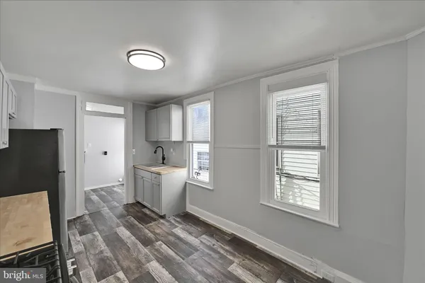 a view of a kitchen with a sink and dishwasher